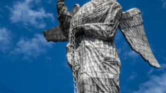 angel statue under blue sky during daytime