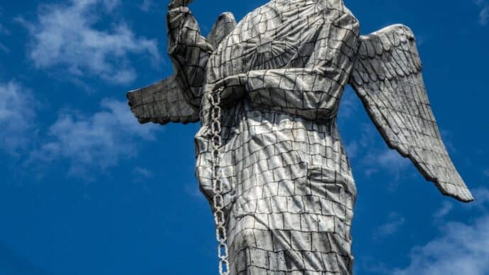 angel statue under blue sky during daytime